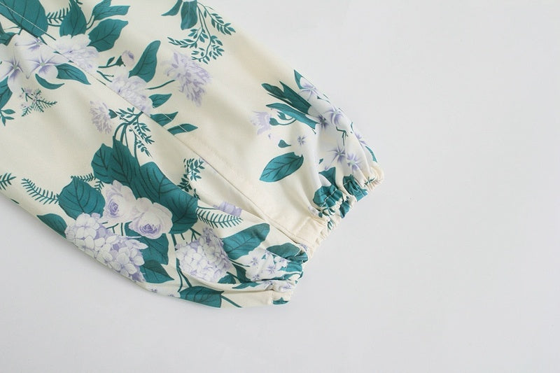 Zoe – Combinaison décontractée à fleurs avec ceinture