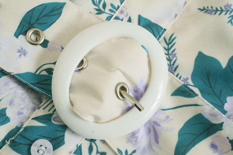 Zoe – Combinaison décontractée à fleurs avec ceinture