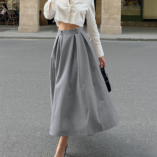 Katy – Jupe Longue Plissée Taille Haute