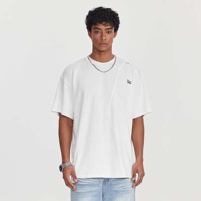 Howard – T-shirt à manches courtes avec couture irrégulière et fermeture éclair latérale
