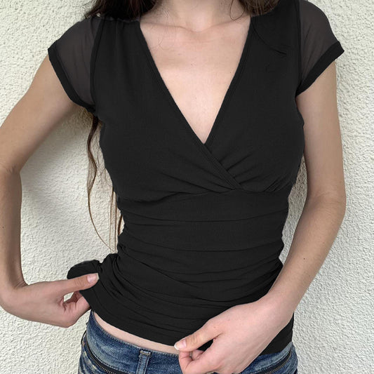 Lucy – Manches Courtes en Maille Plissée et Couleur Pure