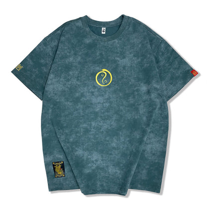 Christian – T-shirt à col rond brodé manches courtes délavé