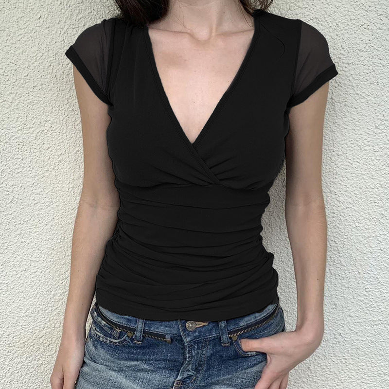 Lucy – Manches Courtes en Maille Plissée et Couleur Pure