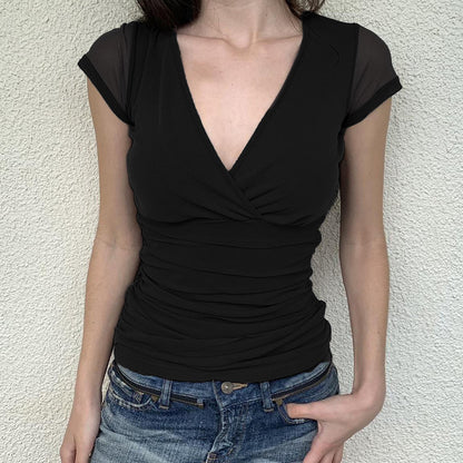 Lucy – Manches Courtes en Maille Plissée et Couleur Pure